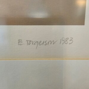 May include: A close-up of a white mount with the signature "F. Torgeson 1983" written in black ink.