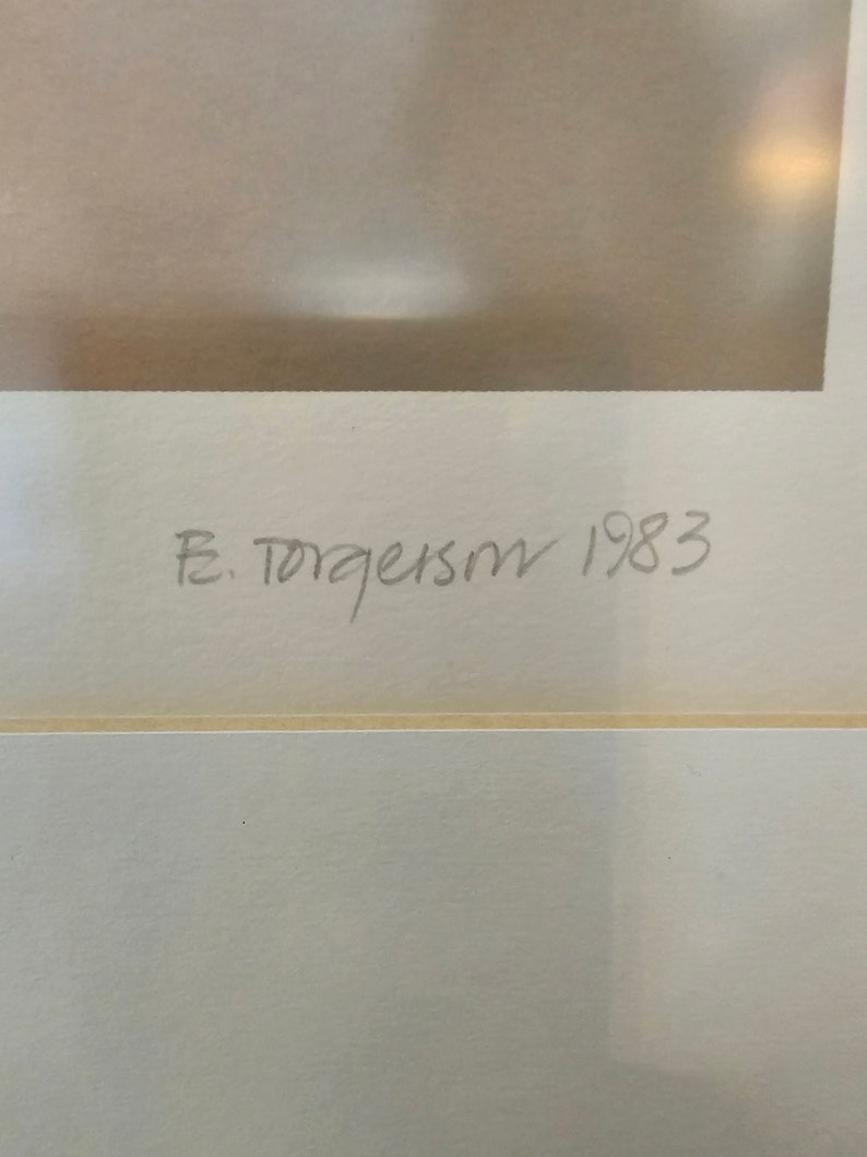 May include: A close-up of a white mount with the signature "F. Torgeson 1983" written in black ink.