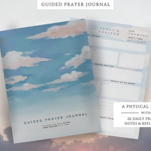 May include: A guided prayer journal with a sky-themed cover featuring clouds and the text "Guided Prayer Journal." The open journal reveals pages for daily prayers, notes, and reflections. The text "A Physical Booklet with 26 Daily Prayers + Notes & Reflections" is also visible.