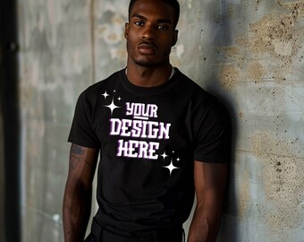 May include: A black t-shirt with the text "YOUR DESIGN HERE" in purple and white stars on the front.