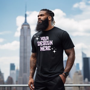 May include: A black t-shirt with the text "YOUR DESIGN HERE" in white with purple accents and small stars.
