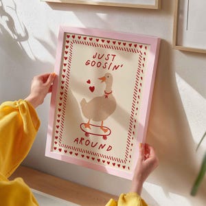 Whimsical ‘Silly Goose on the Loose’ print featuring a playful goose illustration, perfect for nursery decor, kids room wall art, or humorous animal-themed home decoration