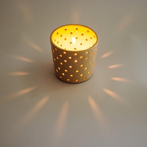 Handmade cream ceramic candle lantern. Tallow pottery tealight holder. Made from stoneware & glazed.