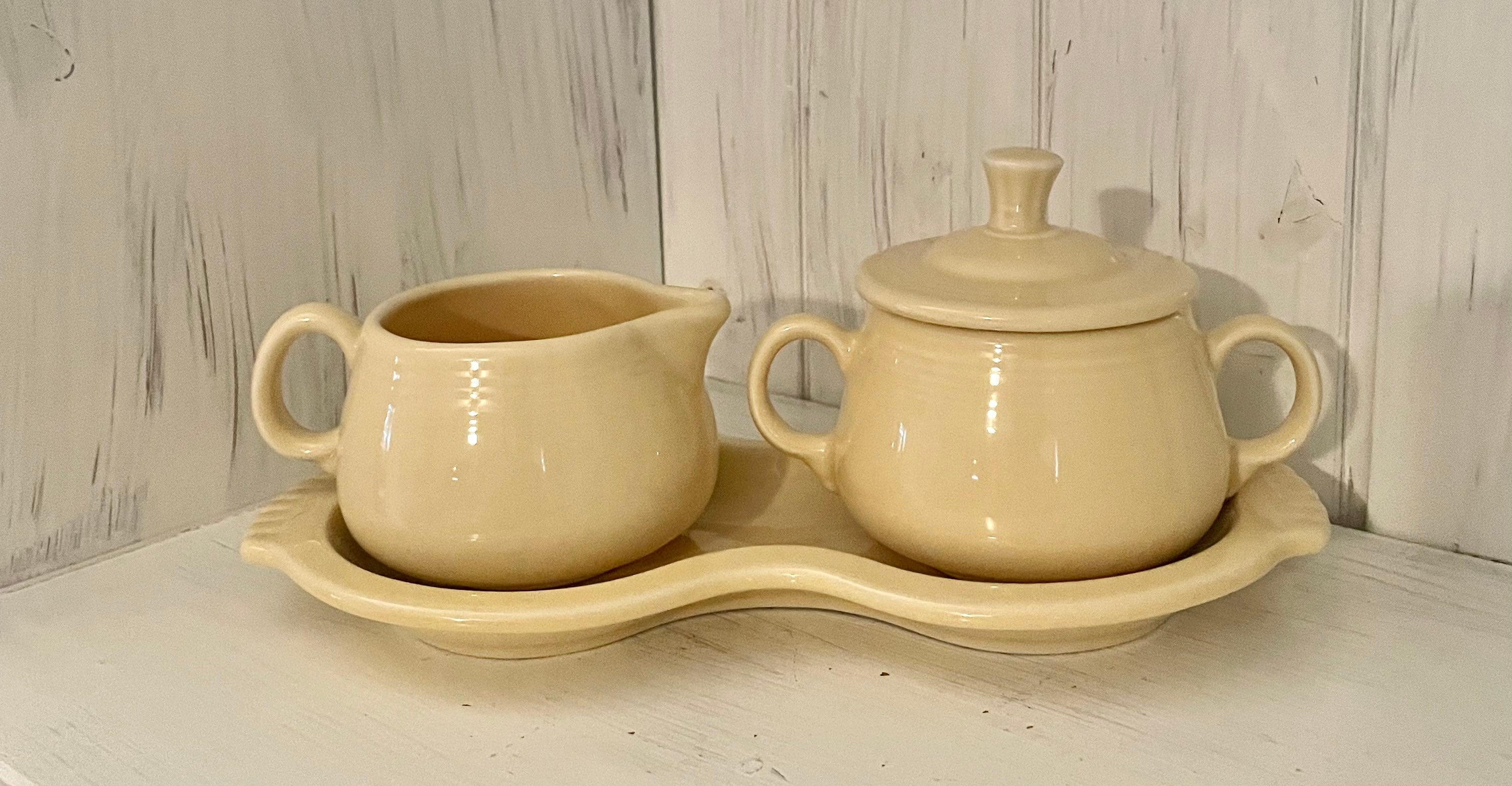 Fiestaware sugar top and creamer
