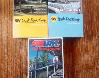 May include: Three vintage skateboarding magazines. The covers feature action shots of skateboarders performing tricks. The magazines are titled "On SkateBoarding" and "411VM Skateboarding". The "On SkateBoarding" magazines are from Summer 2001 and Winter 2003.