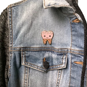 Wear it on your clothing.