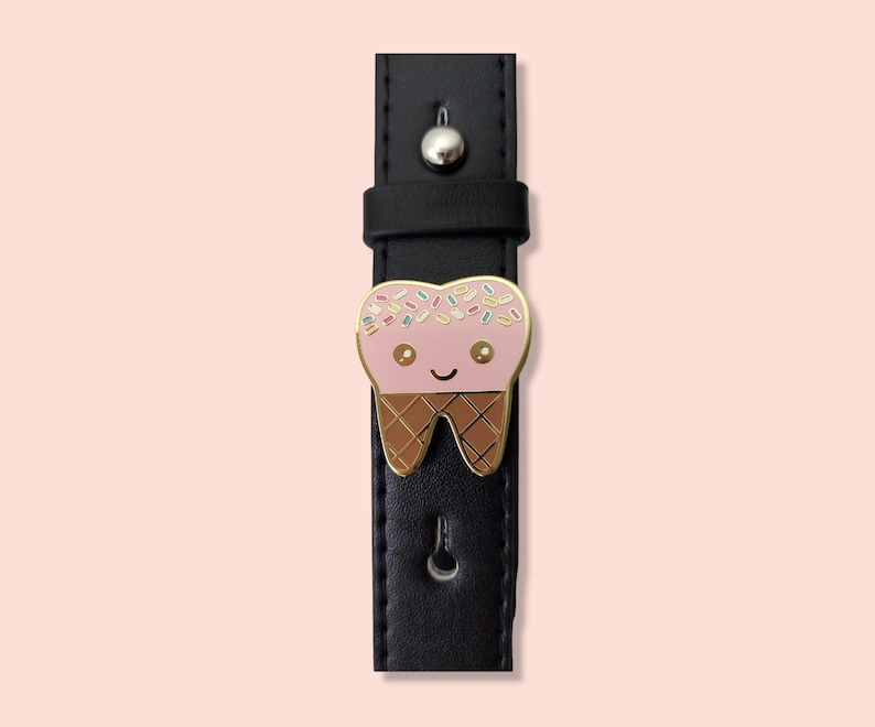 Pin it to your bag straps.