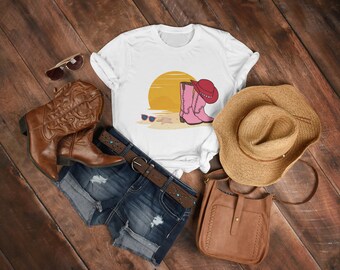Coastal Cowgirl Tee, Beach Sunsets, Boots, and Pink Cowgirl Hats, Western Country Vibes by the Ocean, Cowgirl Aesthetic for Beach Lovers