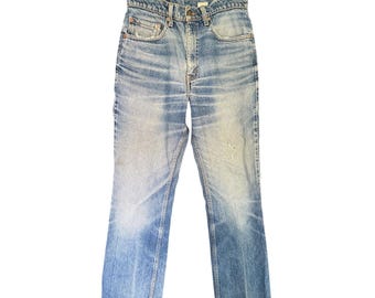 Vintage USA 80s Levi's 517 Bootcut Jeans: Distressed and faded