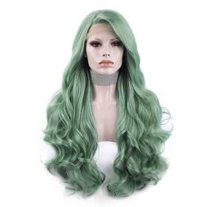May include: A long, wavy, green wig with a lace front. The wig is styled in loose curls and falls to the shoulders.
