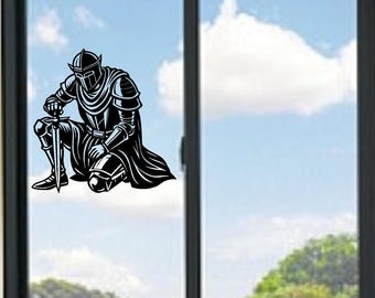 May include: Black and white graphic of a kneeling knight in full armor, holding a sword. The knight is positioned against a backdrop of a blue sky with clouds and a green landscape, creating a striking contrast.