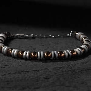 Dapper hematiet armband voor mannen - verfijnde zilveren sluiting - perfect cadeau voor hem