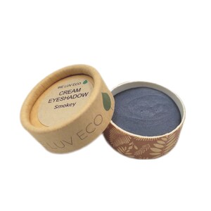 May include: A small, round container of dark gray cream eyeshadow in a cardboard container with the text "WE LUV ECO CREAM EYESHADOW Smokey" printed on the lid.