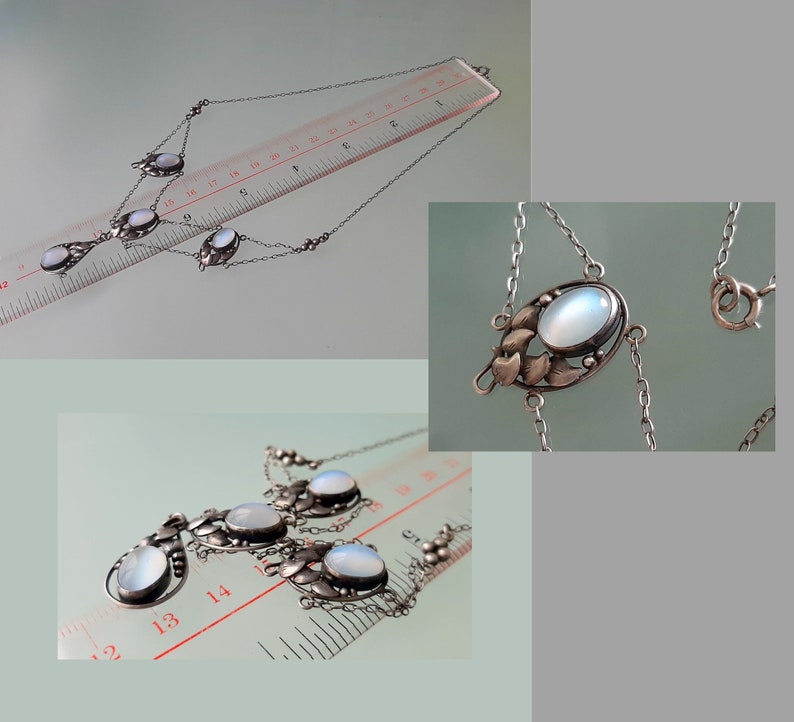 Puede incluir: Un collar de plata con cuatro colgantes ovalados de piedra lunar. Los colgantes est&aacute;n engastados en un delicado dise&ntilde;o floral. El collar mide aproximadamente 45 cm de largo.