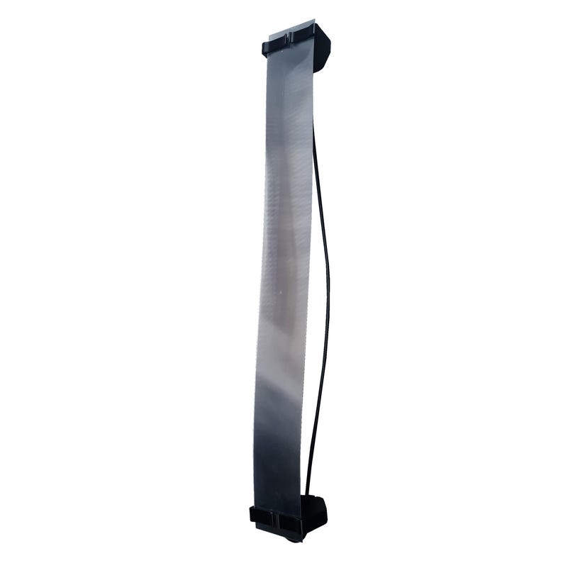 May include: A long, silver ribbon cable with black connectors at each end. A thin, black wire extends from one of the connectors. The cable is against a white background.