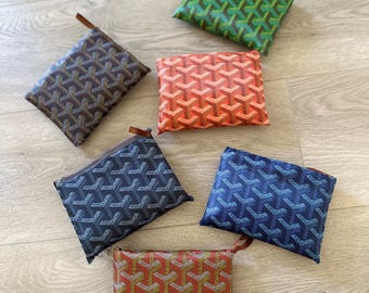Holt renfrew goyard hotsell