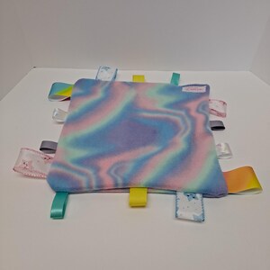 Pastel swirl baby taggie toy