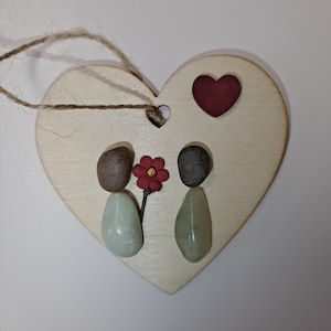 Couple with flower pebble art ornament