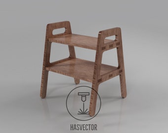 May include: A two-tiered wooden shelf with a natural wood grain finish. The shelf has a rectangular shape with cut-out handles on the top. The legs are angled, and the design is modern. The text "HASVECTOR" and "Laser Cut, Wooden Models..." is visible.