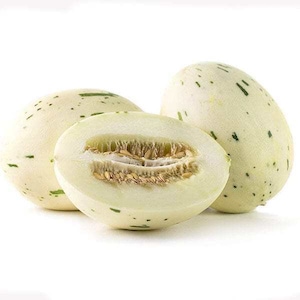 May include: Three white melons with green speckles, one cut open to reveal the seeds and pale green flesh. The melons are oval-shaped and sit on a white background, showcasing the fresh produce.