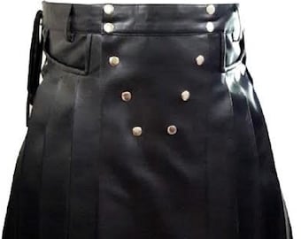 May include: A black leather kilt with silver button accents. The kilt has pleats and a belt.
