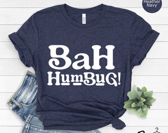 May include: A navy blue t-shirt with the text "Bah Humbug!" printed in white.