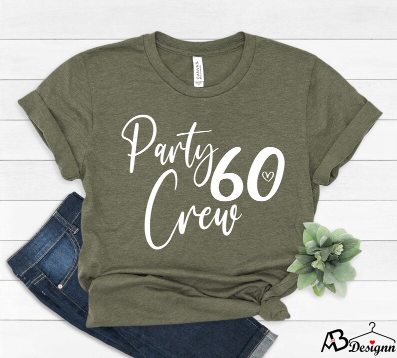 May include: A green t-shirt with the text "Party Crew 60" in white with a small heart symbol.