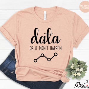 May include: A heather peach t-shirt with the text "data or it didn't happen" and a line graph graphic.