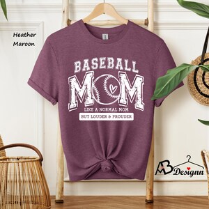 May include: Heather maroon t-shirt with a white graphic that says "Baseball Mom Like a Normal Mom But Louder & Prouder" with a baseball and heart design.