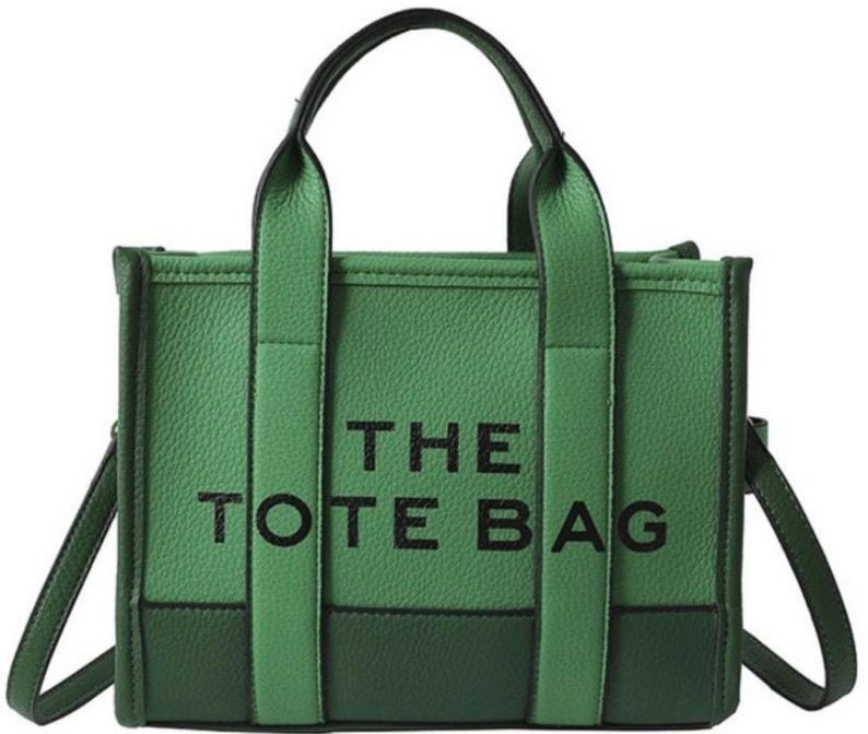May include: A green tote bag with black straps and the text "THE TOTE BAG" printed on the front.