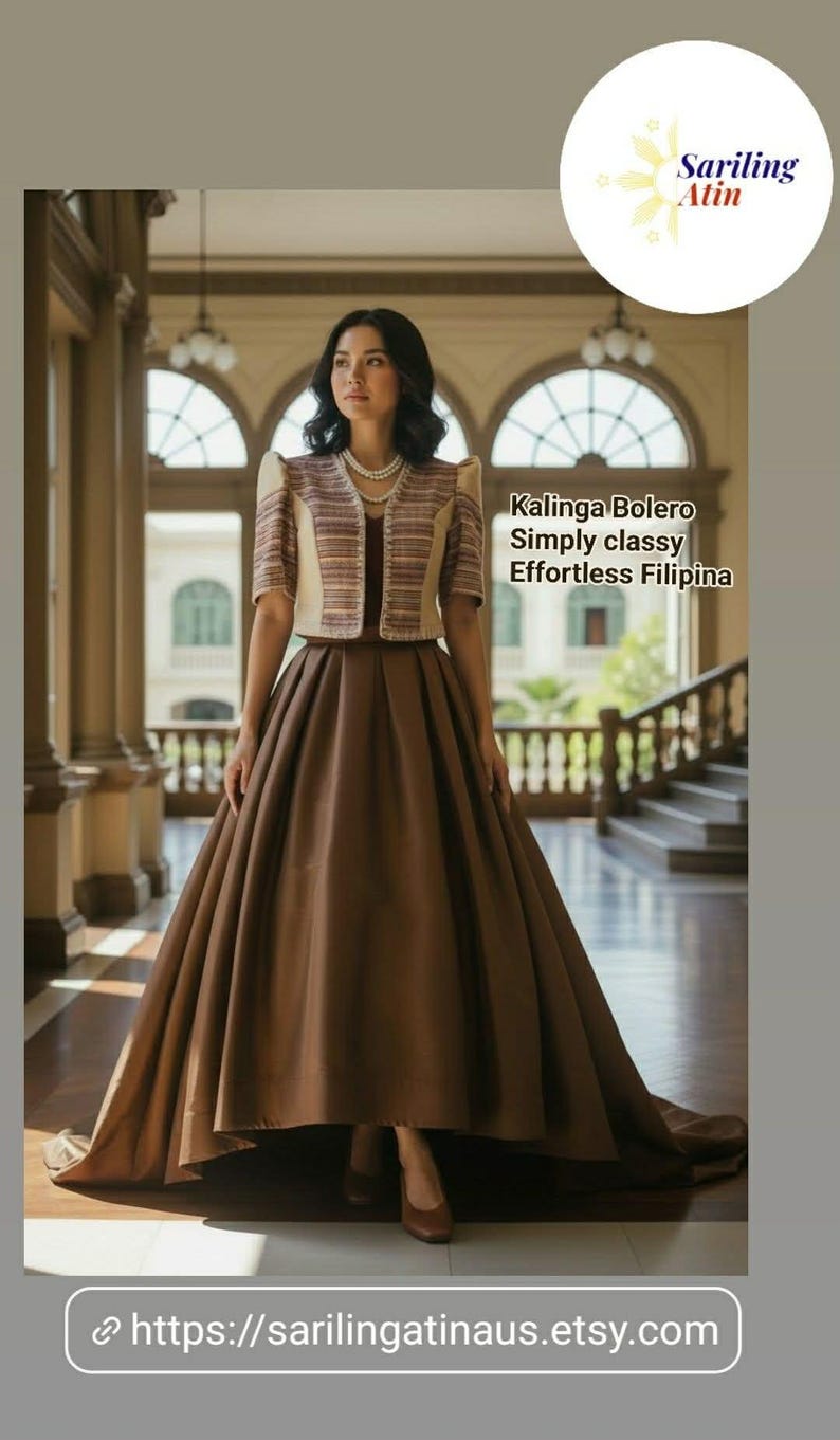 May include: A woman wearing a brown formal dress with a matching bolero jacket. The bolero is beige with brown stripes. The dress has a full skirt and is floor-length. The image includes text that says "Kalinga Bolero Simply classy Effortless Filipina".