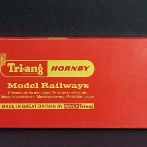 May include: Red box with a yellow label that reads "Triang HORNBY Model Railways" and "Made in Great Britain by ROVEX Triang".