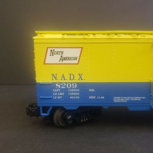 MTH 20-94015 Nestlé NADX #8209 40' Plug Door Refrigerator Car - Yellow ...