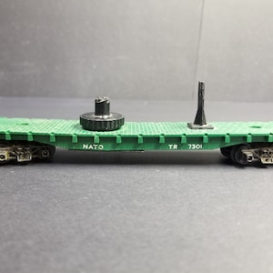 Vintage Tri-Ang oo/ho Scale Nato TR 7301 Helicopter Carrier (Helicóptero no incluido)