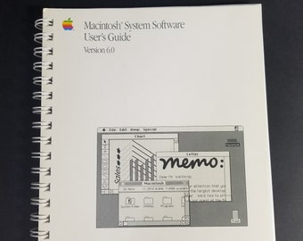 May include: A black and white image of a Macintosh computer screen showing a memo with the text "Dear Mr. Walthrop, Your attention that you are the largest developer. We'd like to offer our guest at the ..." The screen also shows a chart with the word "Sales" and a folder labelled "System Folder".