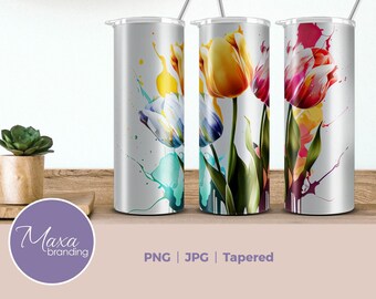 May include: Three stainless steel tumblers with tapered designs featuring colorful watercolor tulip flower designs. The tumblers are on a wooden surface. PNG | JPG | Tapered