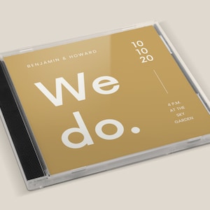 May include: A gold CD case with the text "We do." in white. The case also includes the text "BENJAMIN & HOWARD" and "4 PM AT THE SKY GARDEN".