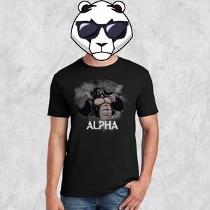 May include: Black t-shirt with a graphic of a muscular gorilla with the word "ALPHA" printed below it.