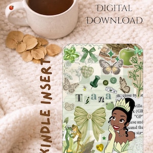 May include: A digital download Kindle insert with a collage of green elements, including butterflies, bows, and a cartoon illustration of a princess. The text "Tiana" is visible, along with "Kindle Insert" and "Digital Download". A cup of coffee and dried leaves are in the background.