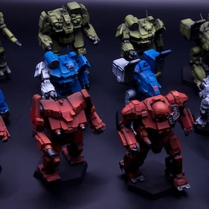 Geschilderd: Battletech 12-mecha's voor Kurita, Steiner, Davion, klaar om te spelen