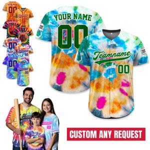 May include: Tie-dye baseball jerseys in various colors, with customizable text and numbers. The image shows several jerseys, including examples with "YOUR NAME" and "Teamname" on the back. A family is also wearing tie-dye shirts.