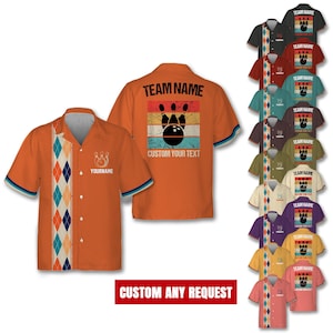 May include: A collection of orange bowling shirts with a retro design. The shirts feature a bowling pin and ball graphic with the text "TEAM NAME" and "CUSTOM YOUR TEXT".
