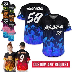 May include: Baseball jerseys in various colors, featuring custom text and numbers. The jerseys display the text "YOUR NAME" and "TEAMNAME" along with the number "58". The design includes flame-like patterns in shades of blue, orange, and red.
