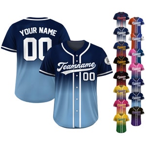 May include: A blue and white baseball jersey with a gradient design. The jersey has a white collar and white buttons. The back of the jersey has the text "YOUR NAME" and the number "00". The front of the jersey has the text "Teamname" and the number "00".