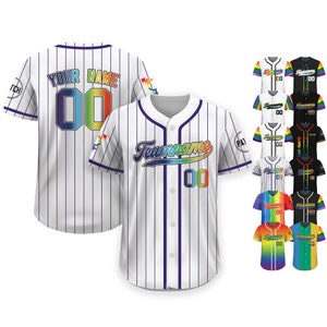 May include: White baseball jersey with purple pinstripes, featuring "YOUR NAME" and "00" in rainbow colors on the back. The front displays "Teamname" and "00" in rainbow hues. Additional jerseys in various colors are also shown.