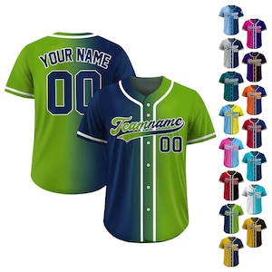 May include: Baseball jerseys in various colours. The front of the jersey features the team name and number, while the back displays "YOUR NAME" and the number. The jerseys have a button-up front and white trim.