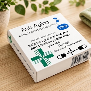 May include: A white rectangular box labeled Anti-Aging 28 Film Coated Tablets. The packaging features a green cross, blue and white capsule icons, a 10mg circle, a barcode, and text stating: help you pretend that you don't look any older than you are.