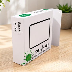 May include: A white rectangular cardboard box with a green ink splatter graphic, a black outlined frame, and text reading 28 FILM COATED GREEN PILLS, Batch No:, and Exp. Date:. The box features a small green circular logo on the top edge.