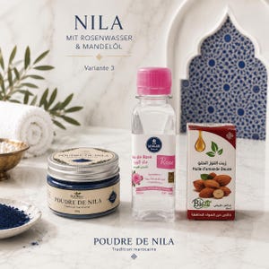 Könnte beinhalten: Ein Set aus Hautpflegeprodukten, bestehend aus einem 100g Tiegel blauer Poudre de Nila, einer 200ml Flasche La Vallee Rosenwasser mit pinkem Verschluss und einer 30ml Packung süßem Mandelöl. Die Produkte sind mit Texten wie Nila und Rose beschriftet.