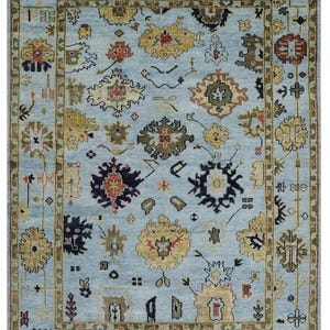 Blue Oushak Rug: Modern Turkish Wool Area Rug with Ivory Accents